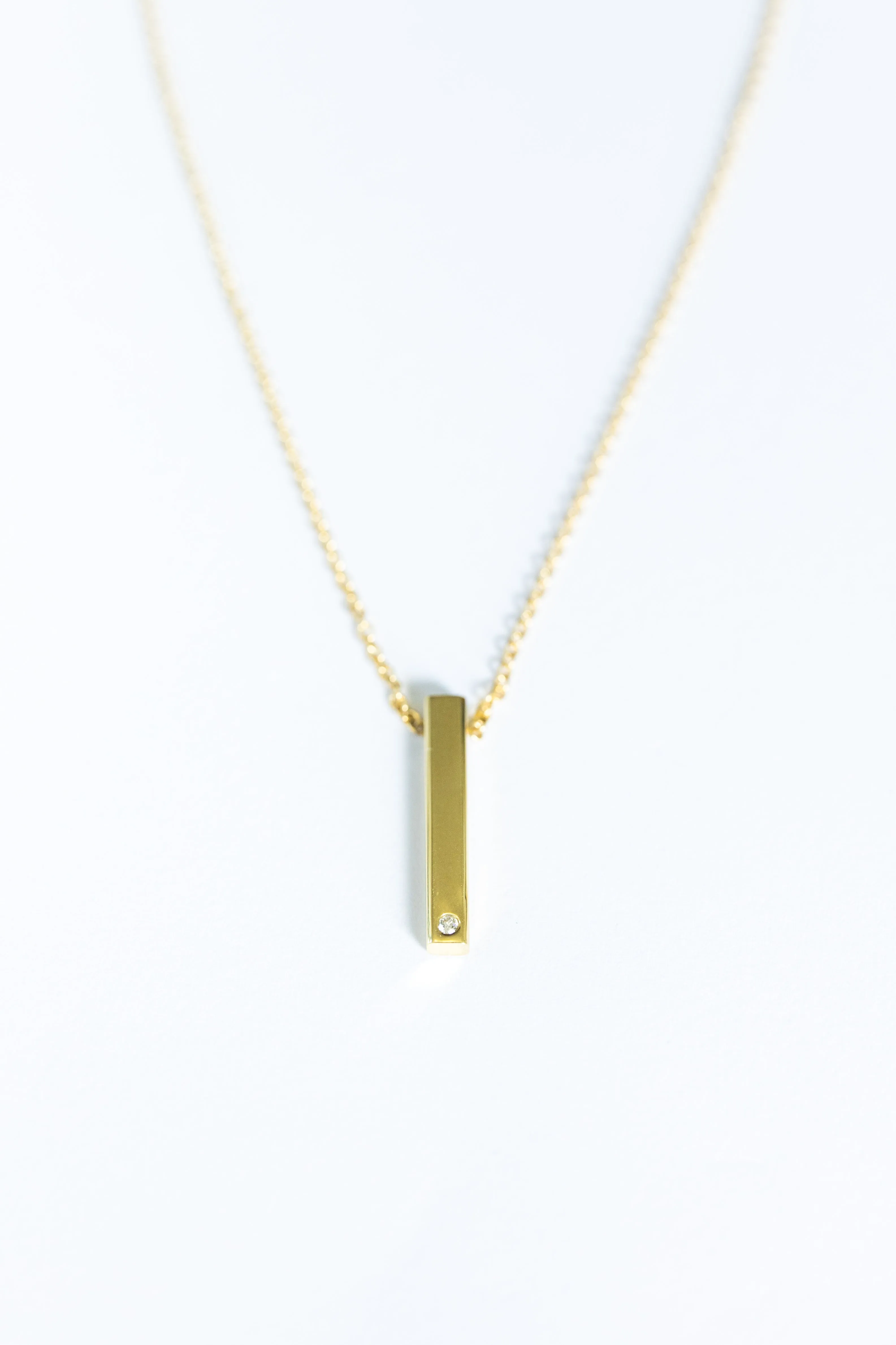 Defining Lines Single Bar One Diamond Pendant