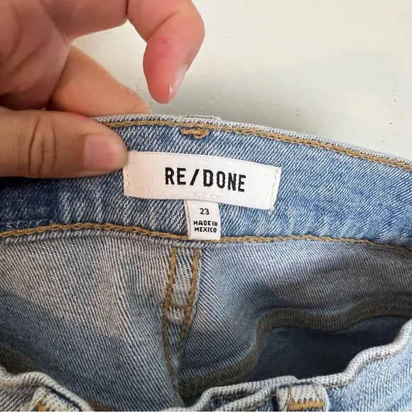 RE/DONE- 90'S High-Rise Jeans Worn Light Blue Button Fly Distressed Knee Denim